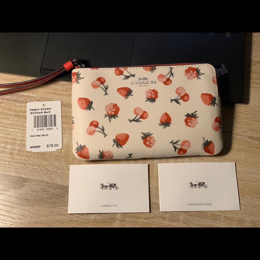 Coach Corner zip wristlet with fruit print